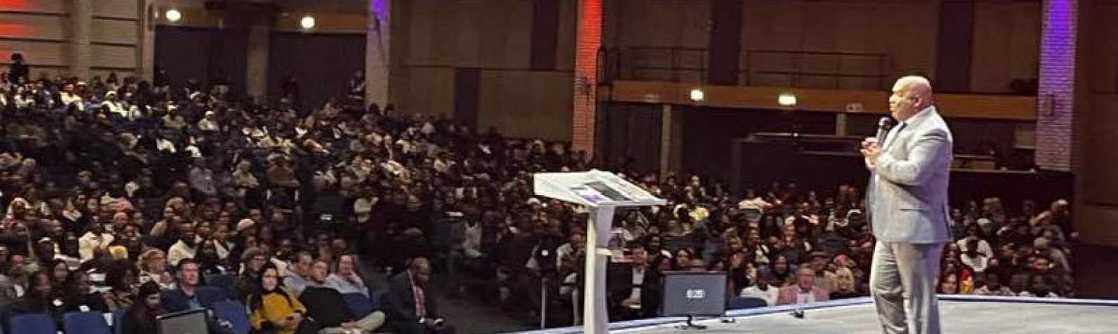 Dr Glenn teaching on stage